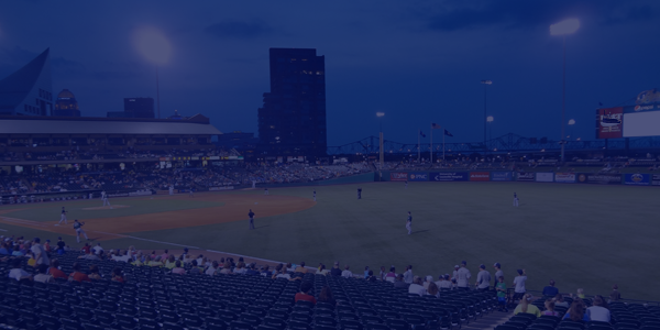 Baseball field at night during a game